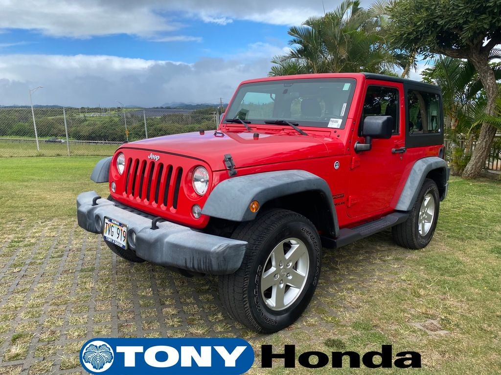 2016 Jeep Wrangler — rear three-quarter view