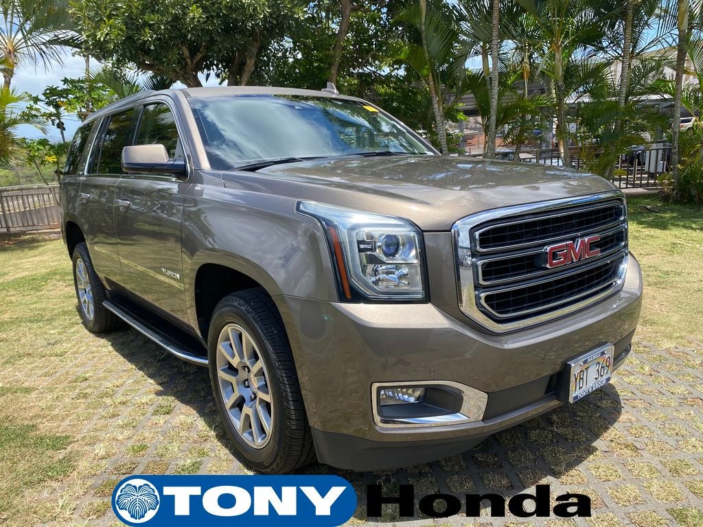 2016 GMC Yukon SLT in Bronze Alloy Metallic — front three-quarter view
