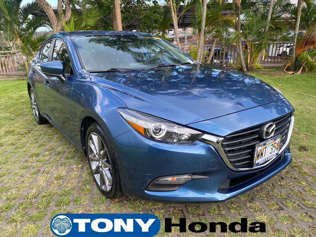 2018 Mazda Mazda3 Touring in Eternal Blue Mica — front three-quarter view
