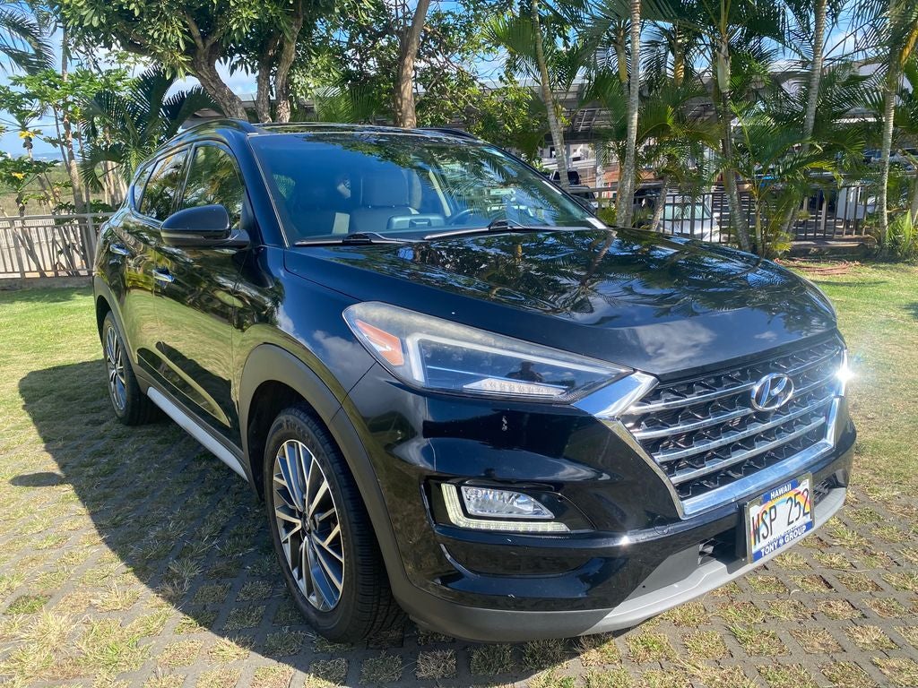 2020 Hyundai TUCSON Ultimate in Black Noir Pearl — front three-quarter view