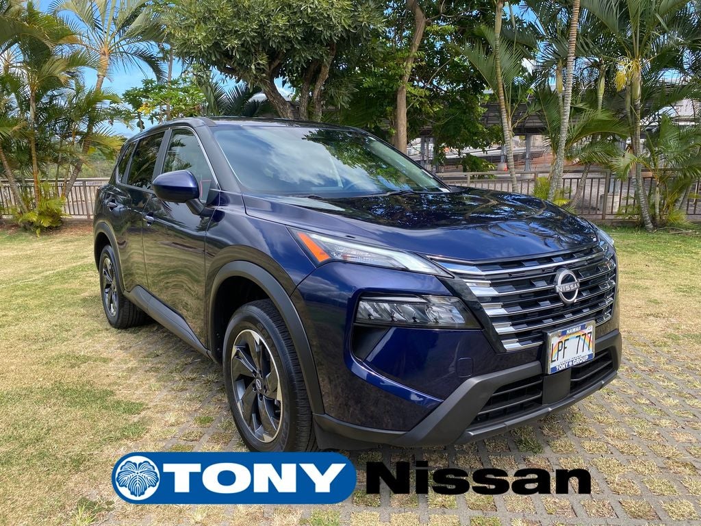 2025 Nissan Rogue SV in Deep Ocean Blue Pearl — front three-quarter view