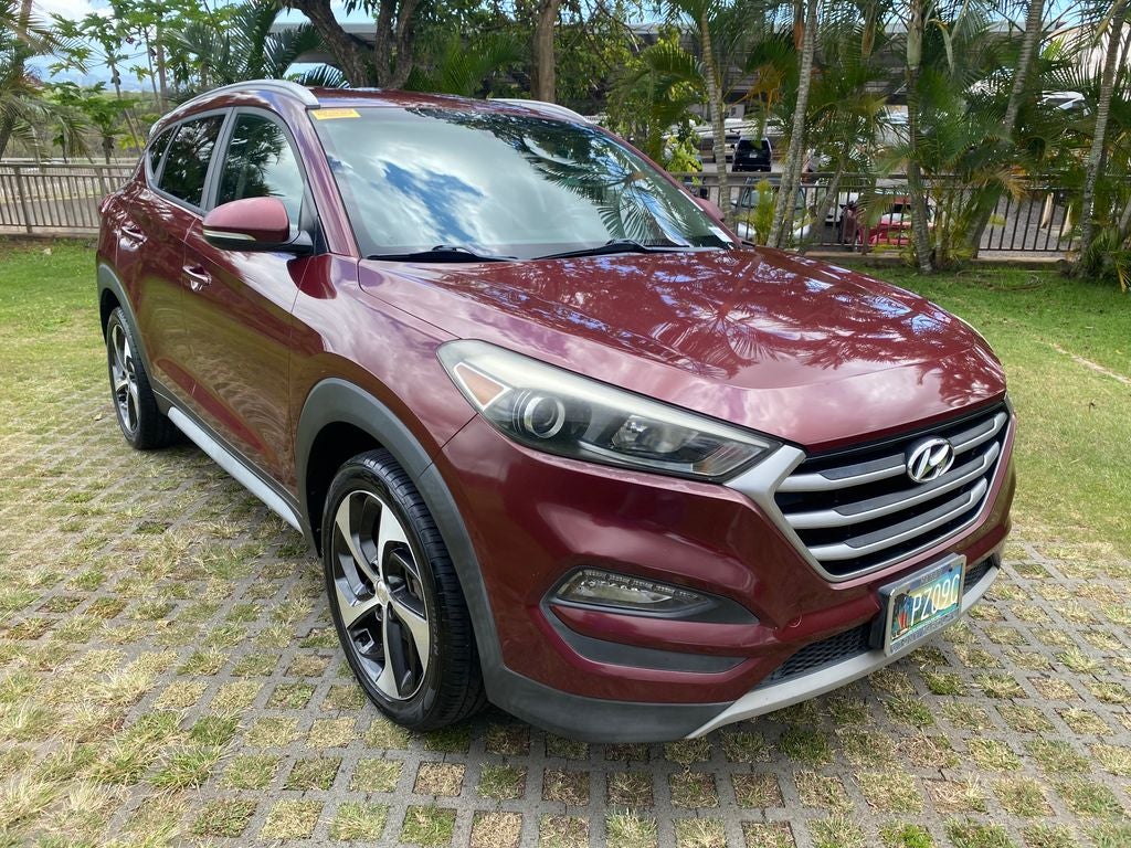2017 Hyundai TUCSON Base in Ruby Wine — front three-quarter view